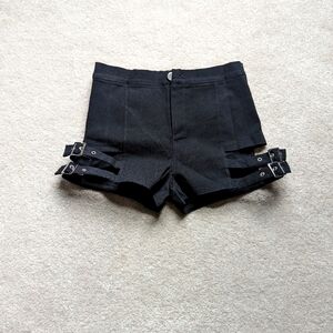 Black shorts with adjustable leg straps